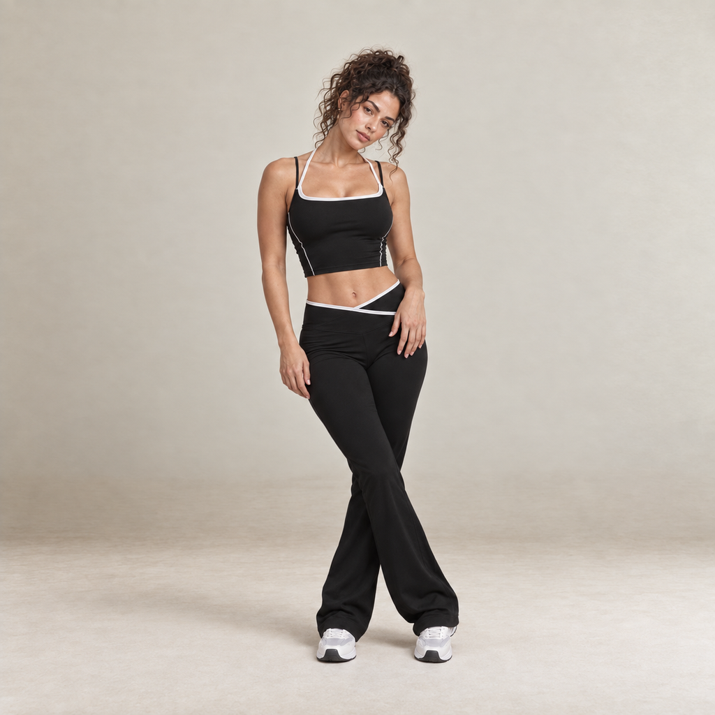 Cora – Women's Contrast Trim Top and Flared Trousers Set in Black — product image 5.