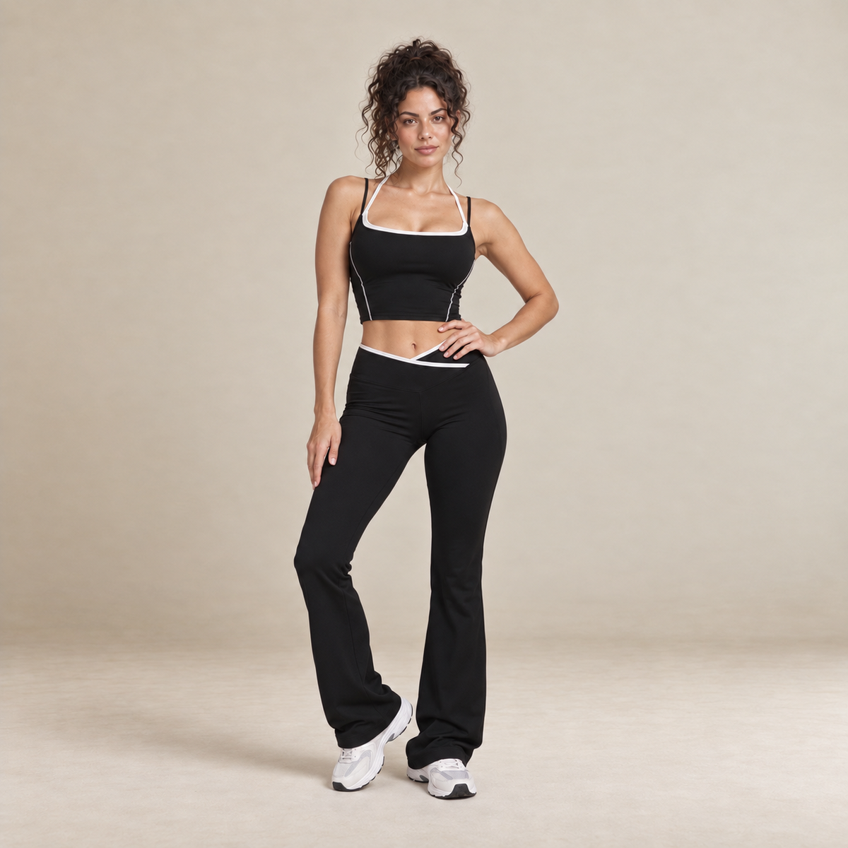 Cora – Women's Contrast Trim Top and Flared Trousers Set in Black — product image 6.