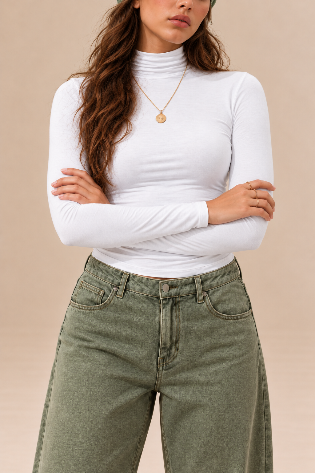 Elara women's white long-sleeve roll neck top, neckline and sleeve detail.