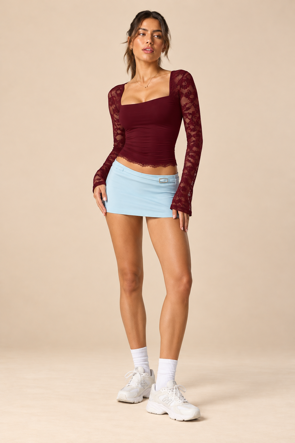 Liora women's lace sleeve crop top in burgundy, showing the square neckline, floral lace sleeves, flared cuffs and scalloped hem.
