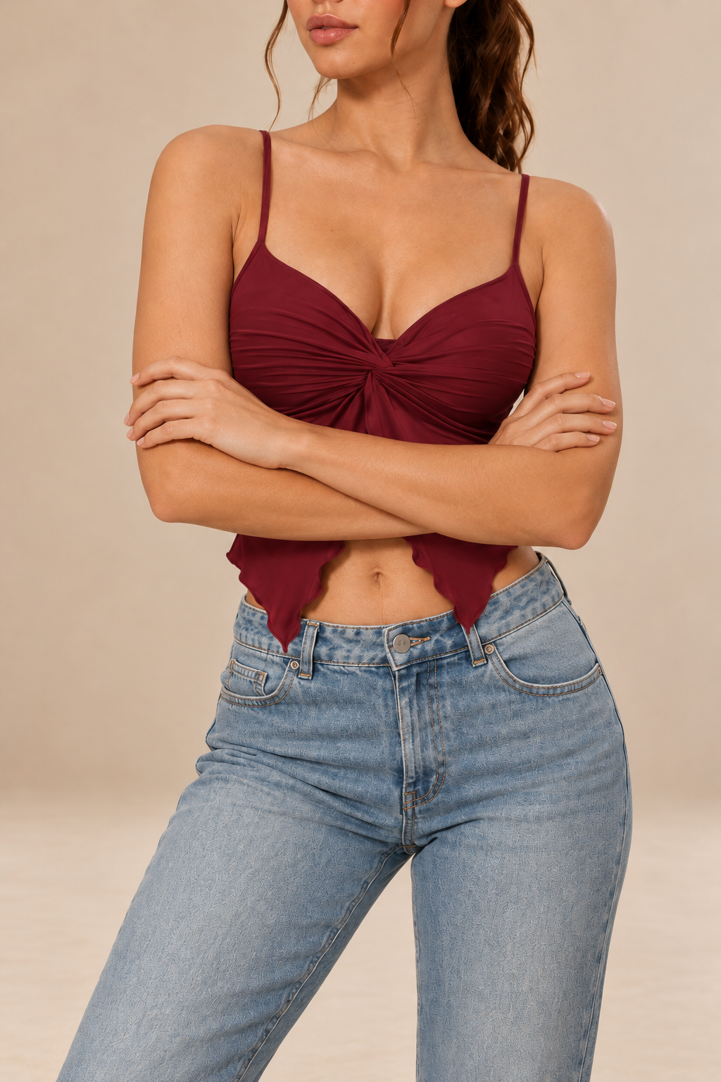 Nora women's twist front cami top in claret, shown in a close-up front view with slender straps, a V-neckline, gathered fabric and a pointed asymmetric hem.